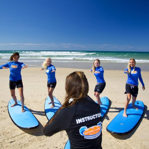 Go Ride A Wave Coolangatta students on boards on the beach